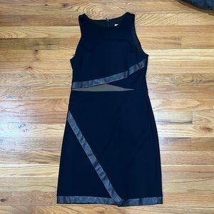 Navy dress with mesh lining over midsection and leather trim